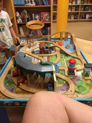 Train table in the kid's section of the store...