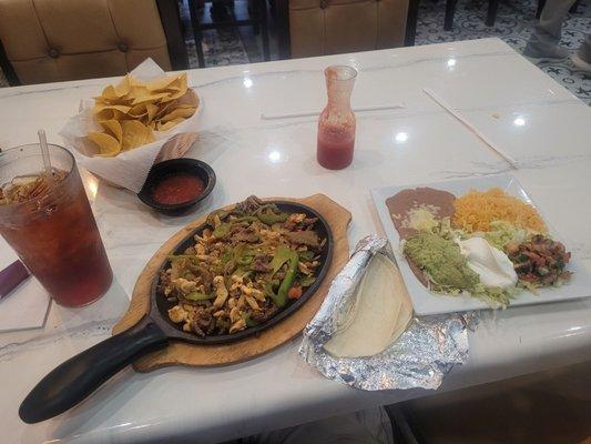 Mixed fajita, opening chips, iced tea