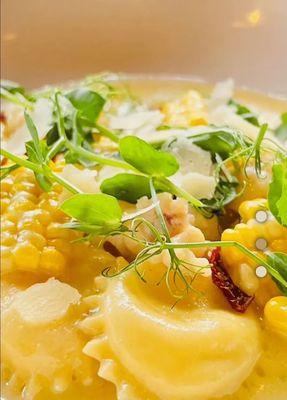 Crab agnolotti is a must...Potato leek, crab, local corn, tomato fonduta, fine herbs, pecorino