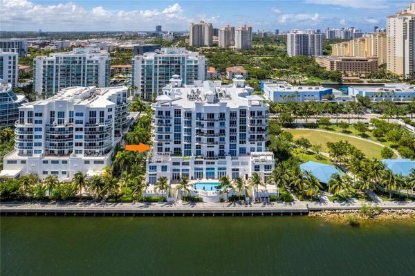 3030 NE 188th Street # 308- Watch the boats go by from this One-of-a-Kind waterfront corner residence in the heart of Aventura!