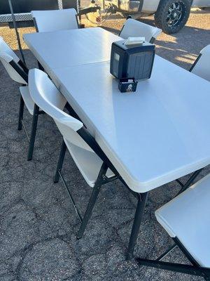 Seating area under pop up tent.