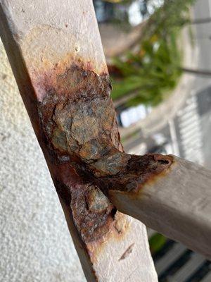 Rust from the constant drip of the AC from the room above