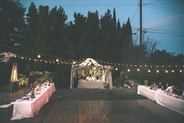 Gazebo, dancing floor, market lights, bridesmaid table, groomsmen table