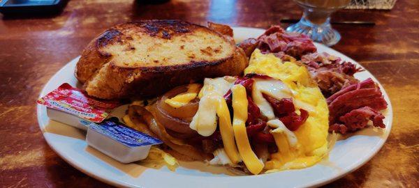 Mc Robert's Plaid with Corned Beef, scrambled eggs, American fries and Irish bacon bread