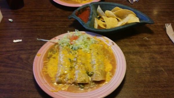 3 Beef Enchiladas smothered with half & half green chili.