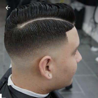 Mid Comb Over Skin Fade With Hard Part.