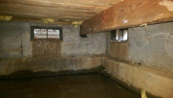 Water intrusion into the crawl space area of a home can cause mold damage and contribute to poor indoor air quality within the home.