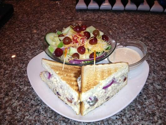 Smoked chicken salad sandwich with side salad