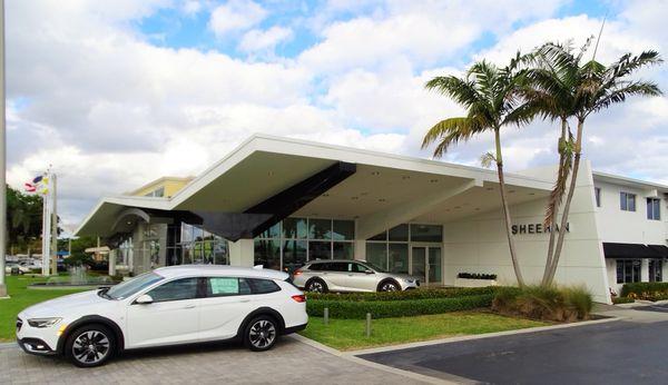 The brand new 2018 Buick TourX featured in front of our gorgeous showroom.