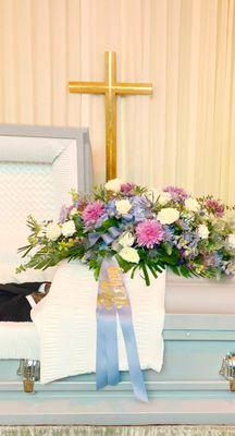 A casket spray by Indy Joy Blooms