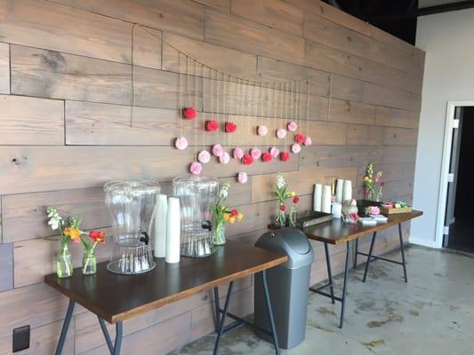 Coffee, tea, and water stations in the lobby for an event