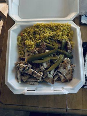 Chicken Shawarma with rice in a takeout box. It's a generous portion and delicious with garlic sauce (not pictured).