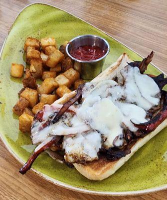 Philly Cheese Steak served with Home Fries!