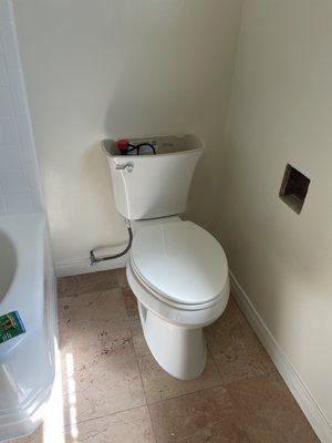 Toilet back in place, good as new!