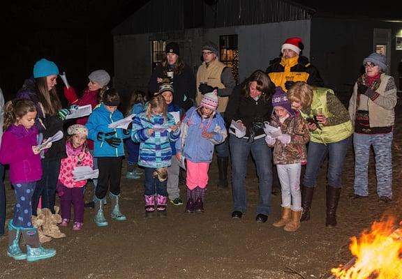 Singing Christmas Carols during the recent Community Tree Lighting Ceremony