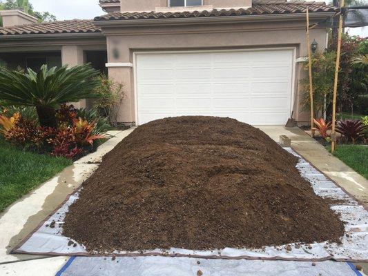 This photo shows 7 YARDS of their "Amended Topsoil #3 (Plant Mix).