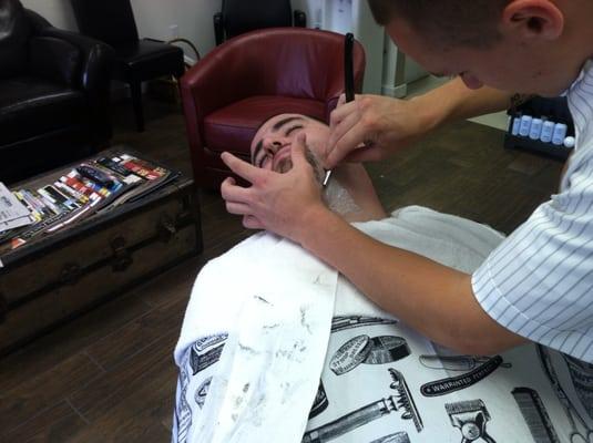 Ben giving an old fashion straight razor shave..... What a treat.....