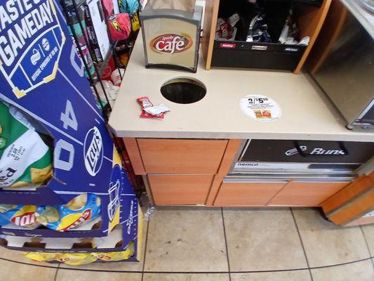 Counter where you apply condiments to the hot dog.   First off who puts ketchup on a hot dog?
 Floor dirty