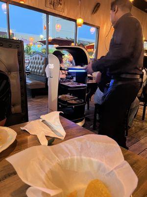 They have the robot waiter