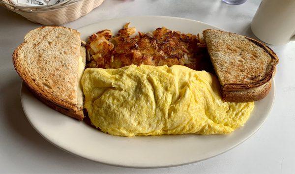 Meat lover's omelette, hash browns, rye toast