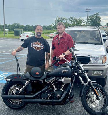 Tyler and myself standing by my new bike.