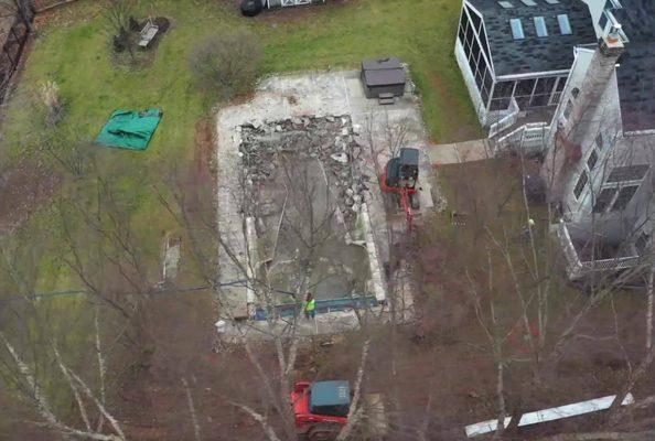 Demolition before pool removal.