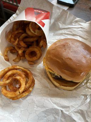 Deluxe Burger with only cheese on it, Curly Fries (Medium)