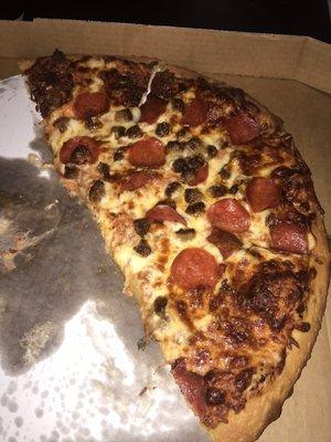 Thin crust sausage pepperoni extra cheese.