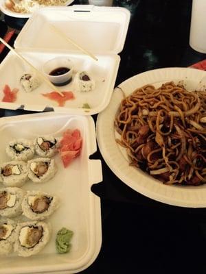 The full roll is Shrimp Tempura and the pieces is what was left of the tuna roll. And chicken yakisoba to the right.