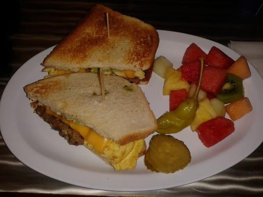 Yummy's Breakfast Sandwich: Egg,Cheese,Sausage,Avocado on Sourdough Bread