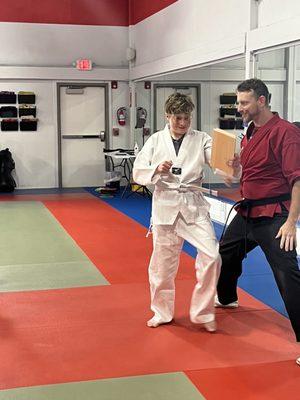 My son broke a board and got his white belt.