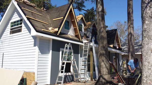 Working on the roof of a TV show Tiny House Nation featured on the FYI channel.