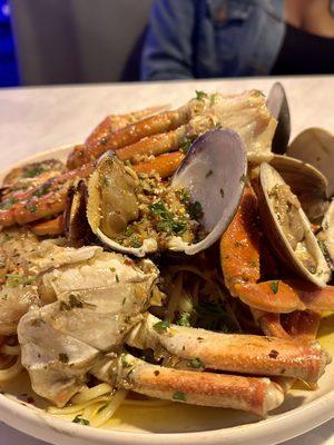 Clams, crab legs, shrimp with pasta