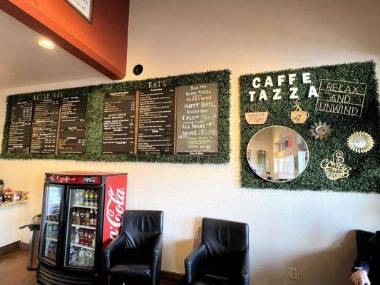 Menu board is on the wall. Pretty easy read.