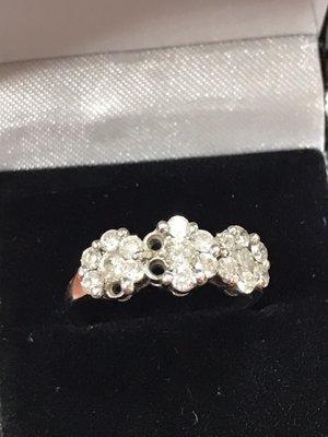 Very poorly made white good and diamond ring