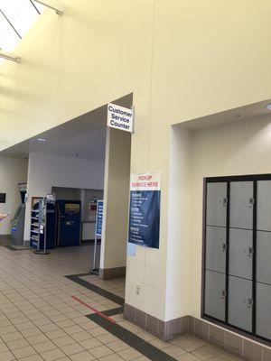 Customer service pickup door is on the opposite side of the hallway from the main counter