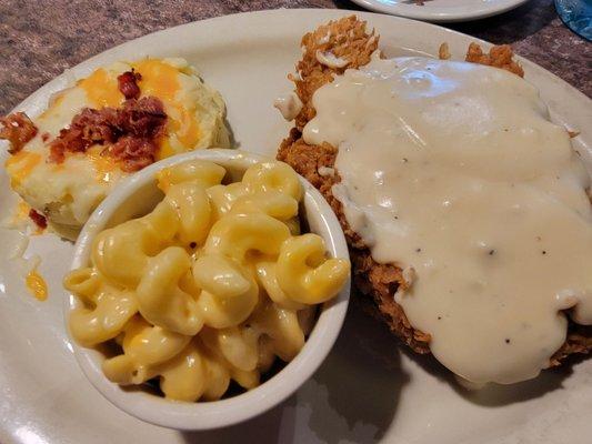 Chicken fried steak with Mac and cheese, and loaded mashed potatoes.