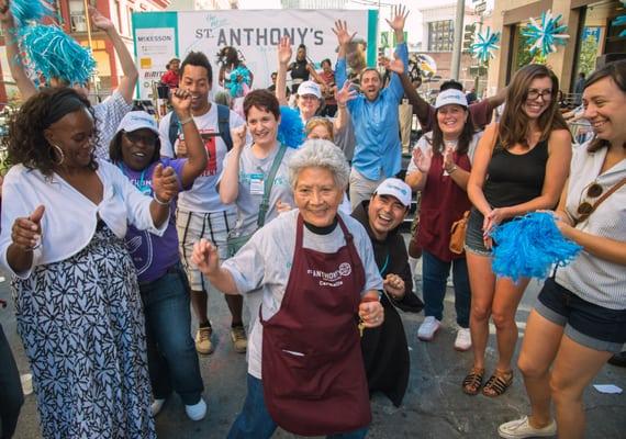 Dancing in the streets to celebrate the Grand Opening of the new St. Anthony's Dining Room on October 4, 2014.