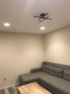 We had a central fixture and 4 recessed lights installed in the living room.