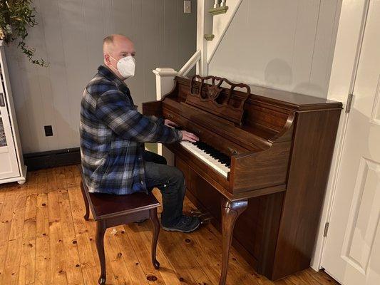 One final check after delivering a piano