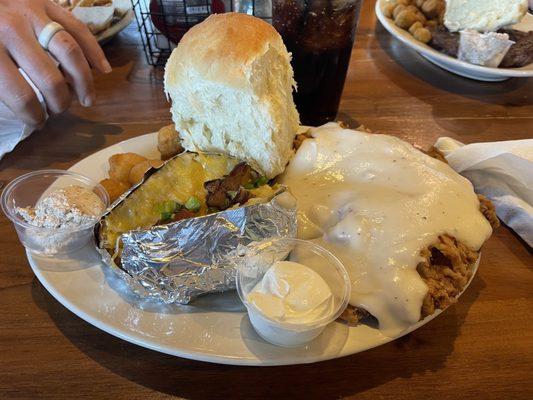 Chicken fried steak with fried corn nuggets and loaded baked potato