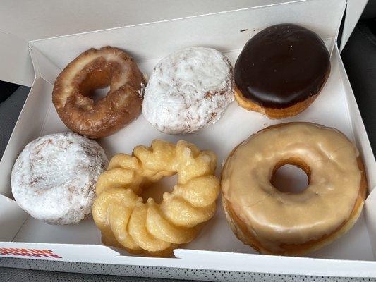 Sour cream, vanilla filled, Bavarian filled  Chocolate filled, French cruller, and maple iced!  Got my fix!