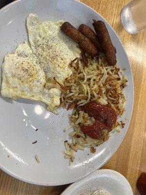 Eggs and sausage with hash browns