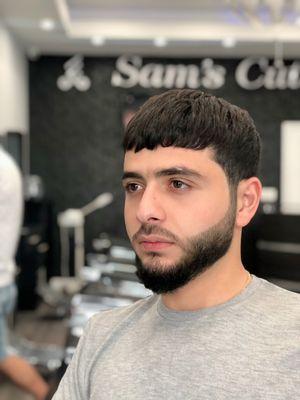 Hairstyle and beard trim