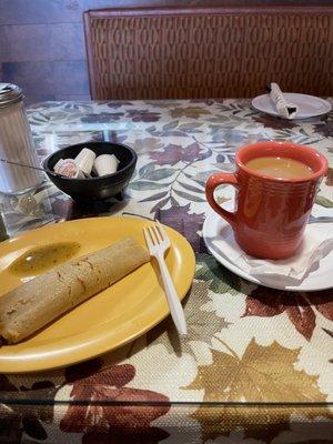 Pork tamale and a warm cup of coffee