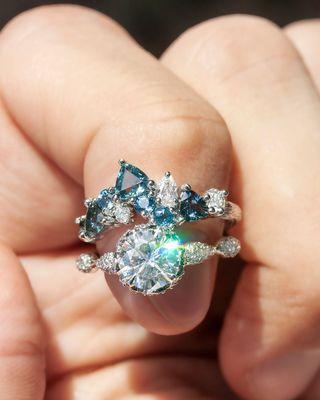 cluster ring with sapphire and round diamond ring