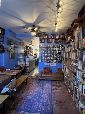 Back room with a full bookshelf wall. Really love that blue