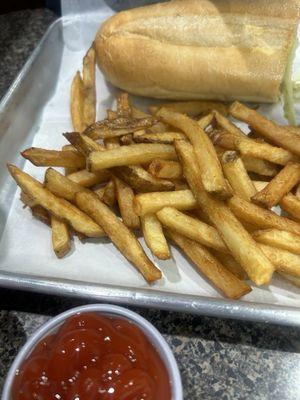 Triple Cheese Steak sandwich and fries.