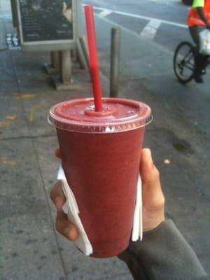 A delicious smoothie of Mango, Papaya, Strawberry, Blueberry and Ginger. Filled to the brim I might add.