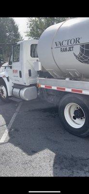 Illegally parked AMLINER commercial vehicle taking up 3 reserved spots with the engine running